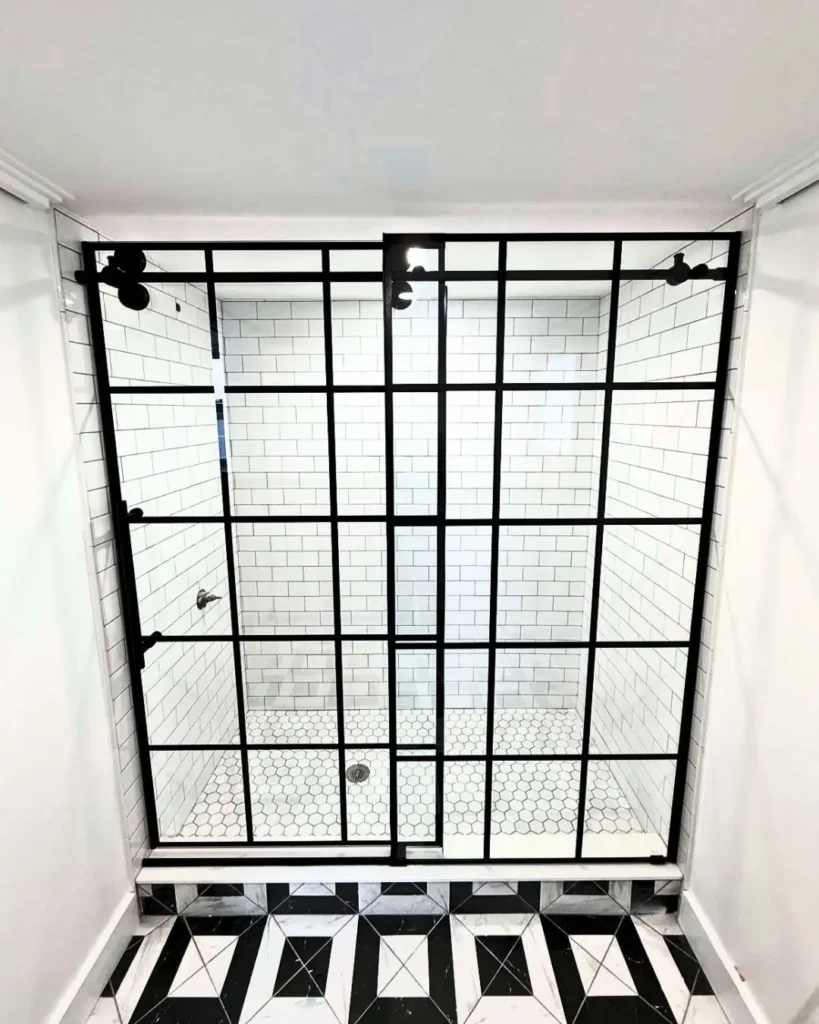 Black grid sliding bypass glass shower door enclosure installed in Portsmouth RI