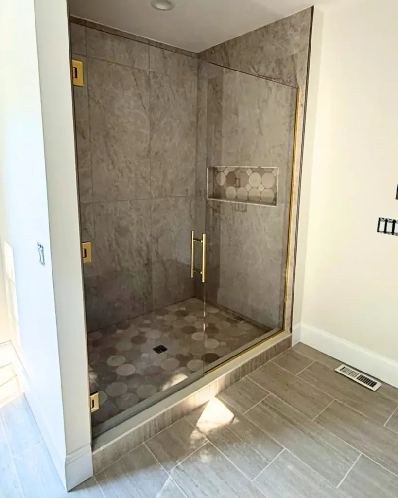 Custom frameless glass shower enclosure installed in East Sandwich MA